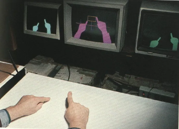 Augmented reality demo featured in M. W. Krueger’s book ‘Artificial Reality II,’ 1991.